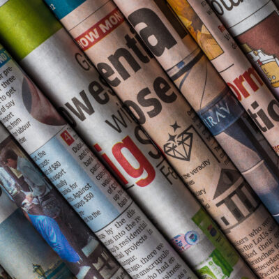Stacked newspapers close up